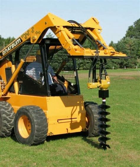 post hole digger for john deere skid steer|truck mounted post hole digger.